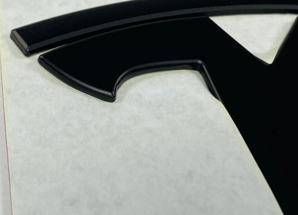 Tesla Model Y T-Logo metal - 2-delt sæt til ombytning - sort mat